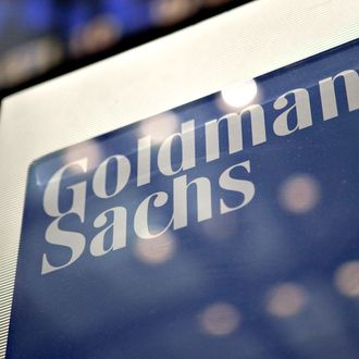 A Goldman Sachs Group Inc. logo hangs on the floor of the New York Stock Exchange in New York, U.S., on Wednesday, May 19, 2010. Goldman Sachs Group Inc. racked up trading profits for itself every day last quarter. Clients who followed the firm's investment advice fared far worse.