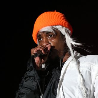 INDIO, CA - APRIL 18: Andre 3000 of Outkast performs onstage during day 1 of the 2014 Coachella Valley Music & Arts Festival at the Empire Polo Club on April 18, 2014 in Indio, California (Photo by Karl Walter/Getty Images for Coachella)