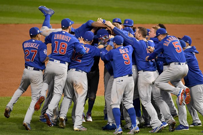 Photos of the Chicago Cubs Hugging After World Series Win