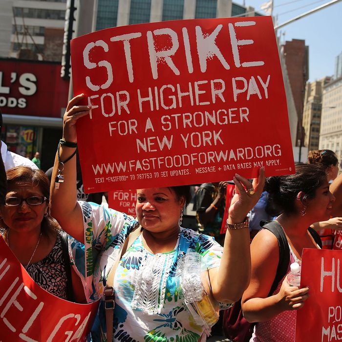 Fast-food workers striking last year.