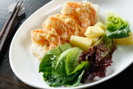 Garlic shrimp over rice, romaine lettuce, pineapple.