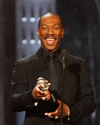 NEW YORK, NY - MARCH 26: Comedian Eddie Murphy speaks onstage at The First Annual Comedy Awards at Hammerstein Ballroom on March 26, 2011 in New York City. (Photo by Dimitrios Kambouris/Getty Images) *** Local Caption *** Eddie Murphy