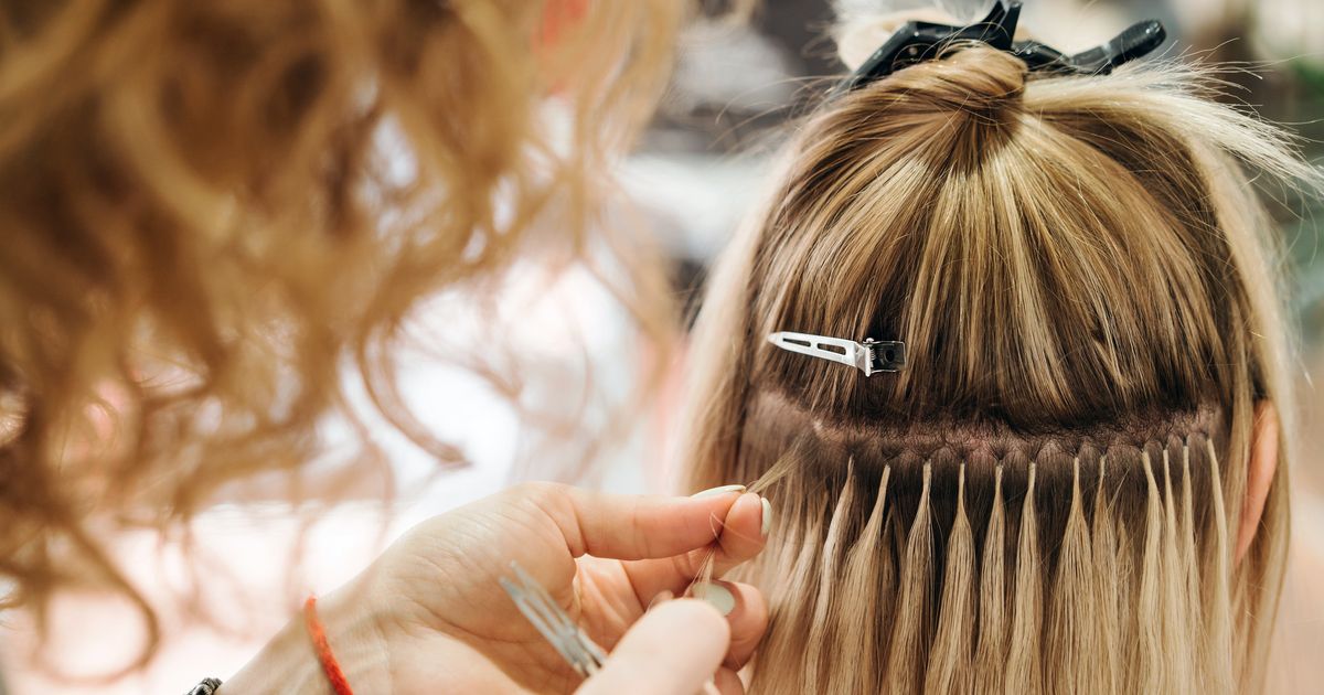 Long luxurious hair extensions displayed on a model