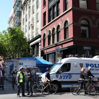 NEW YORK, NY - APRIL 19: New York City police officers watch over a crime scene where investigators searched for evidence of a six year-old boy who has been missing for 33 years April 19, 2012 in New York City. New York City police and F.B.I. investigators searched the basement of a building in New York's SoHo neighborhood for evidence of Etan Patz, a six year-old boy who disappeared 33 years ago on May 25, 1979. (Photo by Justin Sullivan/Getty Images)