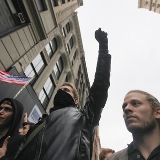 NEW YORK, NY - NOVEMBER 15: Occupy Wall Street activists march through downtown Manhattan after police removed the protesters early in the morning from Zuccotti Park on November 15, 2011 in New York City. Hundreds of protesters, who rallied against inequality in America, have slept in tents and under tarps since September 17 in Zuccotti Park, which has since become the epicenter of the global Occupy movement. The raid in New York City follows recent similar moves in Oakland, California, and Portland, Oregon. (Photo by Mario Tama/Getty Images)