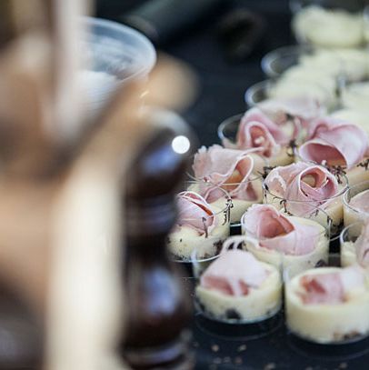 Slices of proscuitto on whipped cotechino.