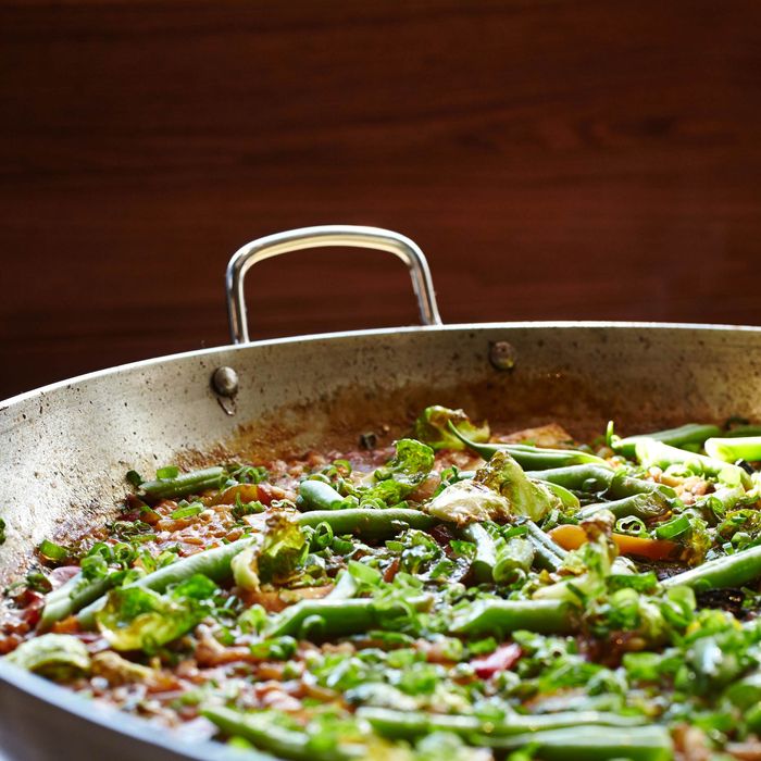 Toro's vegetable paella — $30 for half-size, $60 for full — is the most affordable one on the menu.