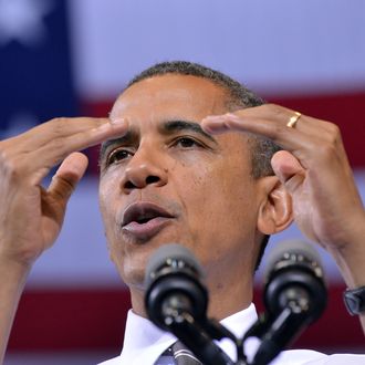 US President Barack Obama speaks during a campaign rally at the Kent State University on September 26, 2012 in Kent, Ohio. Obama and Romney clashed on trade with China, the giant Asian economy, at dueling political events in Ohio, a key midwestern swing state which has seen thousands of blue collar jobs migrate to low cost economies abroad, including China.