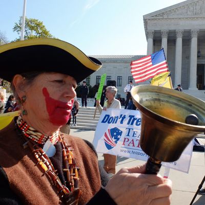 A tea-party supporter protest outside the US Supreme Court on the third day of oral arguements over the constitutionality of the Patient Protection and Affordable Care Act on March 28, 2012 in Washington, DC. The 26 states challenging the law argue that the Affordable Care Act must be completely repealed if the requirement that all Americans buy health insurance -- known as the 