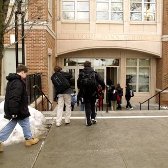 Students arrive at the Horace Mann School on February 4, 2004 in the Riverdale section of the Bronx, New York. Photographer: Graham Morrison/ Bloomberg News.
