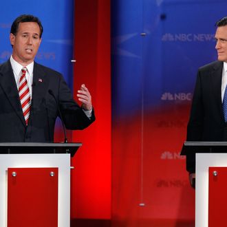 Republican presidential candidate, former U.S. Sen. Rick Santorum (L) makes a point during the NBC News, National Journal, Tampa Bay Times debate held at the University of South Florida on January 23, 2012 in Tampa, Florida.