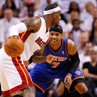 LeBron James #6 of the Miami Heat posts up Carmelo Anthony #7 of the New York Knicks during Game Two of the Eastern Conference Quarterfinals in the 2012 NBA Playoffs at American Airlines Arena on April 30, 2012 in Miami, Florida. 