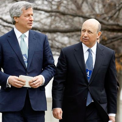 JP Morgan Chase CEO Jamie Dimon (L) and Goldman Sachs CEO Lloyd Blankfein leave the White House after they and 13 other bank heads met with President Barack Obama March 27, 2009 in Washington, DC.
