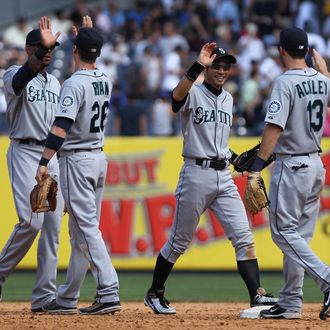 NEW YORK, NY - JULY 27: The Seattle Mariners celebrate the win against the New York Yankees on July 27, 2011 at Yankee Stadium in the Bronx borough of New York City. (Photo by Nick Laham/Getty Images)
