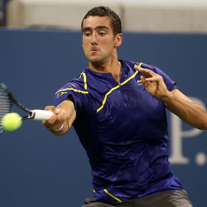 NEW YORK, NY - AUGUST 27: Marin Cilic of Croatia returns a shot during his men's singles first round match against Marinko Matosevic of Australia on Day One of the 2012 US Open at USTA Billie Jean King National Tennis Center on August 27, 2012 in the Flushing neigborhood of the Queens borough of New York City. (Photo by Alex Trautwig/Getty Images)
