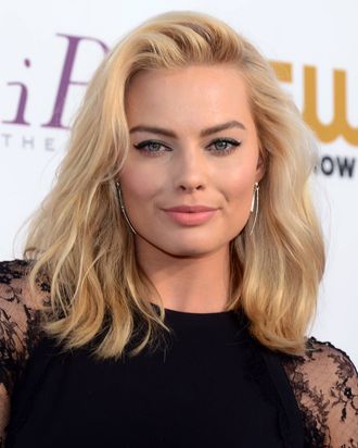 Actress Margot Robbie poses during red carpet arrivals for the Critic's Choice Awards in Santa Monica, California on January 16, 2014.