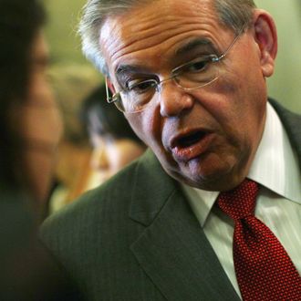 U.S> Sen. Robert Menendez talks with reporters outside the Senate Chamber after voting for the cloture vote on the Tax Compromise bill in the U.S. Capitol December 13, 2010 in Washington, DC. The U.S. Senate held the cloture vote, a key procedural hurdle, on the bill which is a $858 billion tax cut package reached last week by U.S. President Barack Obama and congressional Republicans. 