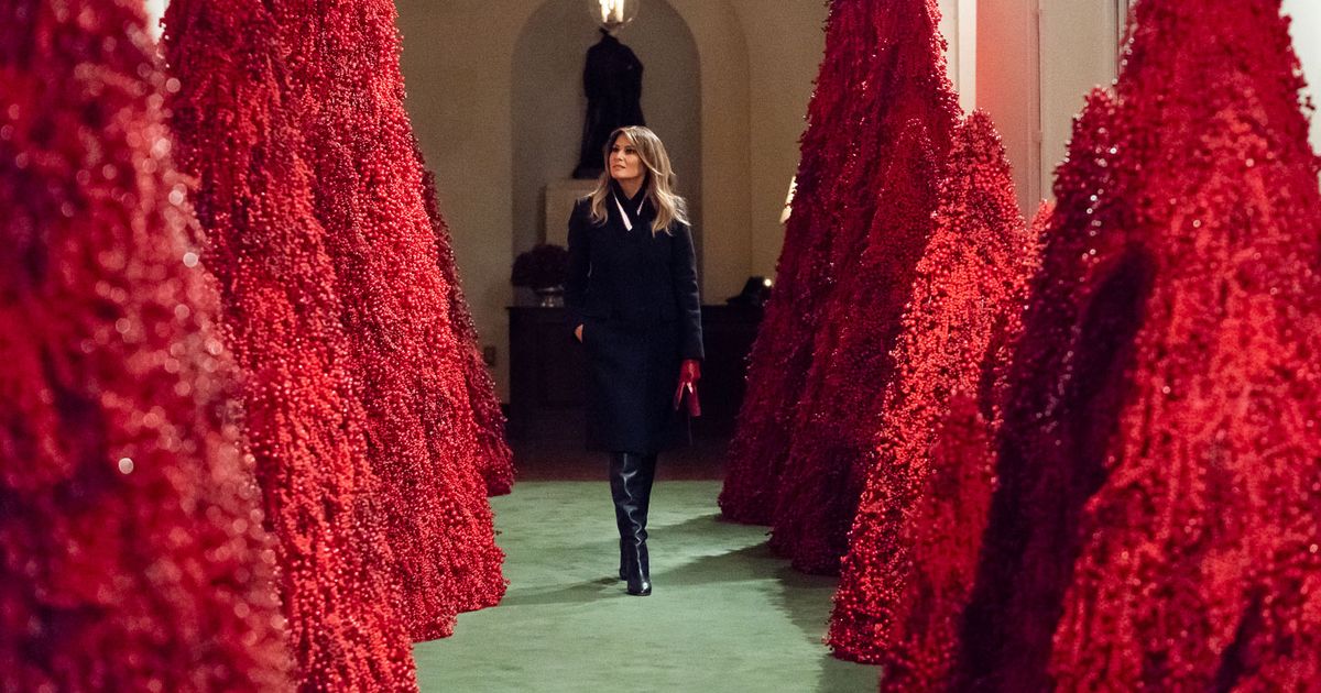 Melania’s Red Christmas Trees Are Being Stripped of Berries