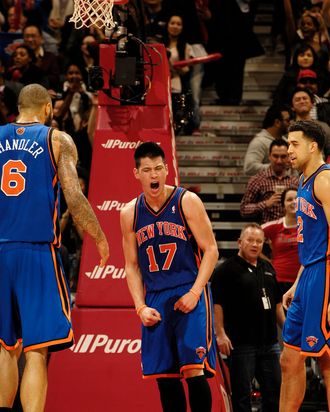 Jeremy Lin #14 of the New York Knicks (center) reacts after the final buzzer during the defeat of the Toronto Raptors on February 14, 2012 at the Air Canada Centre in Toronto, Ontario, Canada.