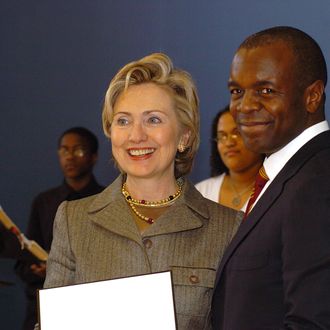 Senator Hillary Rodham Clinton presents the award to Alphonse Fletcher, Jr., President and CEO of Fletcher Asset Management.