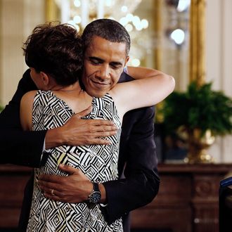 WASHINGTON - JUNE 22: U.S. President Barack Obama (R) embraces Amy Wilhite of Marblehead, Ohio, before speaking during an event to mark the 90-day anniversary of the signing of the Affordable Care Act Act June 22, 2010 in Washington, DC. Immediately after a meeting with Health and Human Services Secretary Kathleen Sebelius, Labor Secretary Hilda Solis, state insurance commissioners, and insurance company CEOs, Obama announced the release of new regulations implementing the patients' bill of rights protections included in the Affordable Care Act. (Photo by Chip Somodevilla/Getty Images) *** Local Caption *** Barack Obama;Amy Wilhite