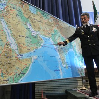 Iran's Navy Commander Admiral Habibollah Sayari points at a map during a press conference in Tehran on December 22, 2010, as saying that Iran will launch 10 days of naval drills from December 24, covering east of Strait of Hormuz and the Gulf of Oman to the Gulf of Aden. AFP PHOTO/HAMED JAFARNEJAD/FARS NEWS/Fars News (Photo credit should read Hamed Jafarnejad/AFP/Getty Images)