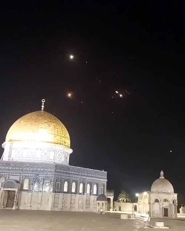 Rocket trails in the sky above the Al-Aqsa Mosque compound in Jerusalem.