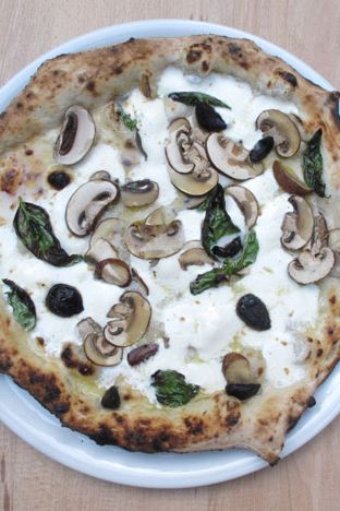 The Black Widow, with mozzarella, mushrooms, herbs, black garlic, scallions.