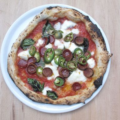 The Colony, with mozzarella, sauce, pepperoni, honey, pickled chilies.