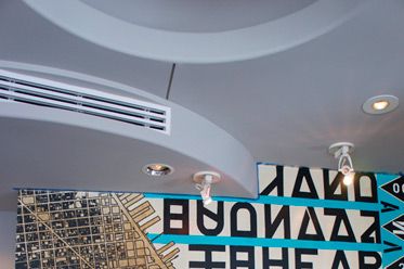 This mural depicts a map of the city along with a 