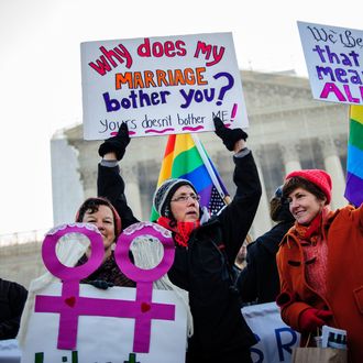 Activists from both sides gather in front of the the Supreme Court in Washington, D.C. as the Court hears arguments for the first time Tuesday on whether gays and lesbians have a constitutional right to marry in a California case that could affect the law nationwide.