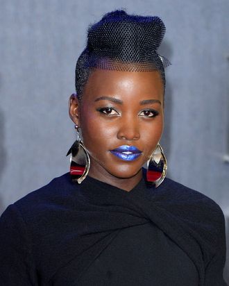 Lupita's brave blue lips.