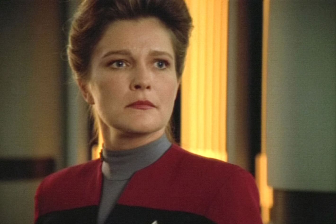 Kate Mulgrew as Captain Kathryn Janeway. 