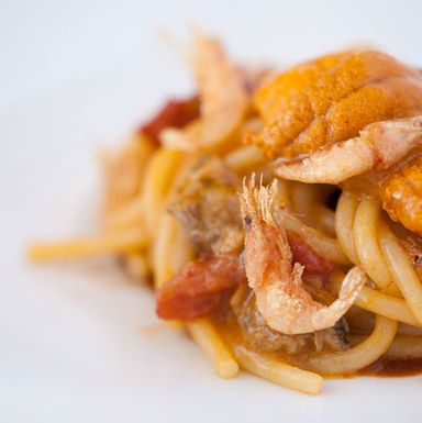 Giuseppe Cocco spaghetti with yellow tomato sauce, sea urchin, fried ghost shrimp and arugula