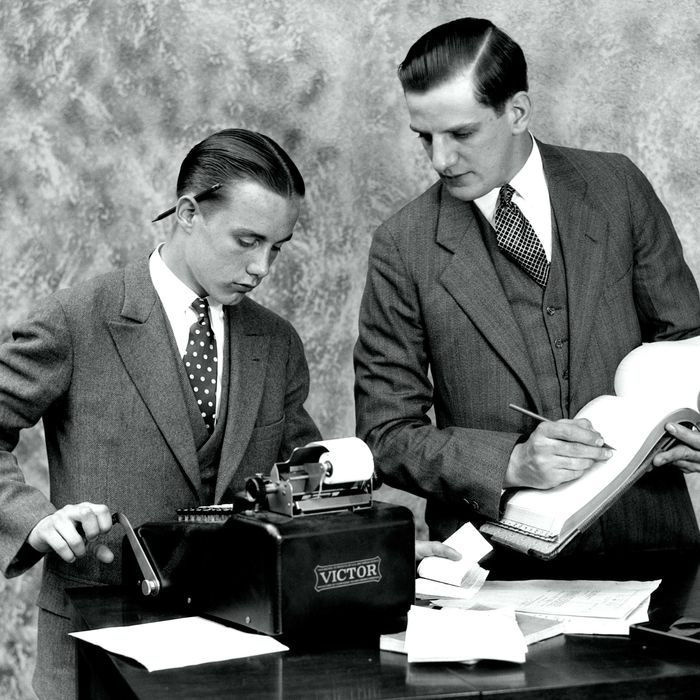 1920s bookkeeper and young assistant