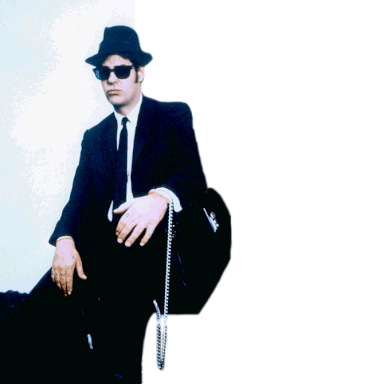 Making their first appearance on Saturday Night Live in 1976, the Blues Brothers, composed of comedians Dan Aykroyd and the late great John Belushi, were an R&B revivalist band. In character, lead vocalist “Joliet” Jake Blues (named after a prison) and harmonica-playing backup singer Elwood Blues (named after an ammunitions factory) fronted the band, which featured musicians like Paul Shaffer and members of the SNL house band.