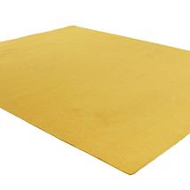“A large yellow rug from a bedroom in the home of David Lynch.”