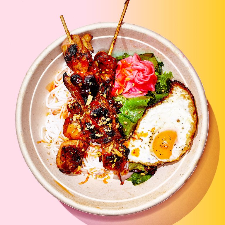 Lumpia Shack’s BBQ Bowl With Rice Noodles and Chicken, $13  Filipino barbecue meets rice bowl at this pop-up Seaport Smorgasburg stand, where banana-ketchup-marinated chicken thighs crown cold noodles and calamansi-dressed greens, garnished with pickled radish, fried garlic, and sweet chile sauce. Add a fried egg for $2.  19 Fulton St., nr. Front St.; daily through October.