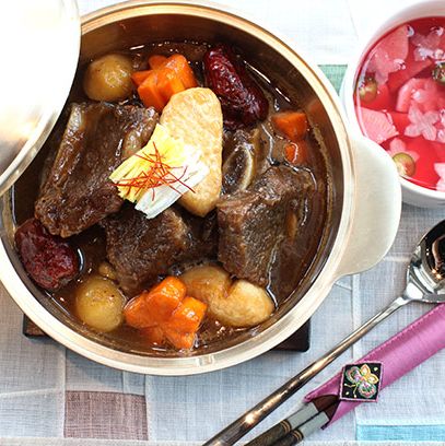 Prime rib eye braised in chef's special sauce with radish, carrot, and jujube