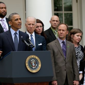WASHINGTON, DC - APRIL 17: U.S. President Barack Obama (2L) makes a statement on gun violence as U.S. Vice President Joe Biden (3L), and family members of Newtown, CT shooting victims look on in the Rose Garden of the White House on April 17, 2013 in Washington, DC. Earlier today the Senate defeated a bi-partisan measure to expand background checks for gun sales. (Photo by Win McNamee/Getty Images)