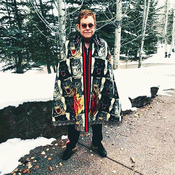 Elton John Wears Gucci Tiger Cape In Aspen, Colorado