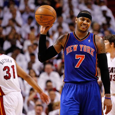 Carmelo Anthony #7 of the New York Knicks reacts to committing a foul during Game Two of the Eastern Conference Quarterfinals in the 2012 NBA Playoffs against the Miami Heat at American Airlines Arena on April 30, 2012 in Miami, Florida. 