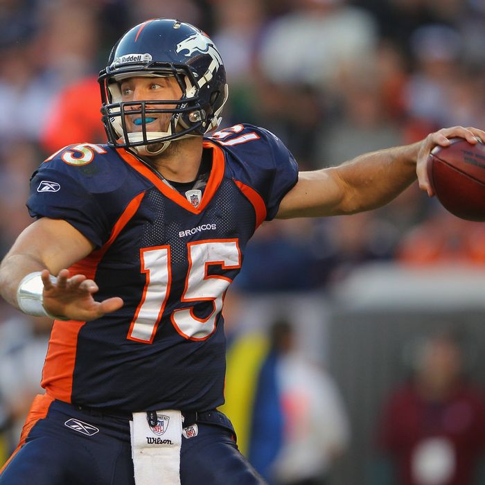 Quarterback Tim Tebow #15 of the Denver Broncos delivers a pass against the New England Patriots.