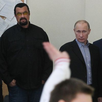 U.S. actor Steven Seagal and Russian President Vladimir Putin are seen visiting Sambo-70, a Russian martial art and combat sport school, March 13, 2013 in Moscow, Russia. 