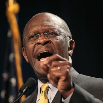 DES MOINES, IA - OCTOBER 22: Republican Presidential Candidate Herman Cain speaks to a gathering of conservative Christians at the Iowa Faith & Freedom Coalition Presidential Forum on October 22, 2011 in Des Moines, Iowa. Candidates Herman Cain, Michele Bachmann, Rick Perry, Newt Gingrich, Ron Paul, and Rick Santorum are scheduled to speak at the event, all hoping to gain support of the roughly 1000 in attendance in front of the January 3, 2012 Iowa caucus. (Photo by Scott Olson/Getty Images)