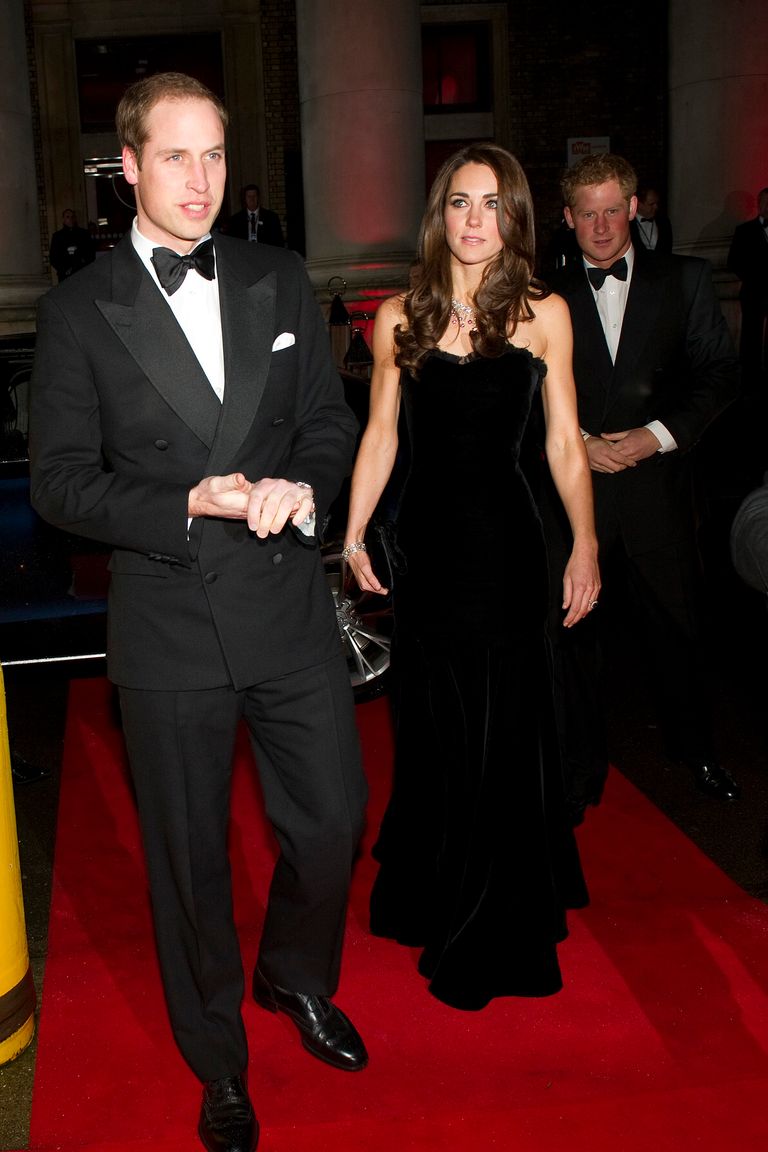 (FromL) Prince William, Duchess of Cambridge and Prince Harry arrive at the 2011 Sun Military Awards at Imperial War Museum on December 19, 2011 in London.     AFP PHOTO/ WPA POOL/ ARTHUR EDWARDS (Photo credit should read ARTHUR EDWARDS/AFP/Getty Images)