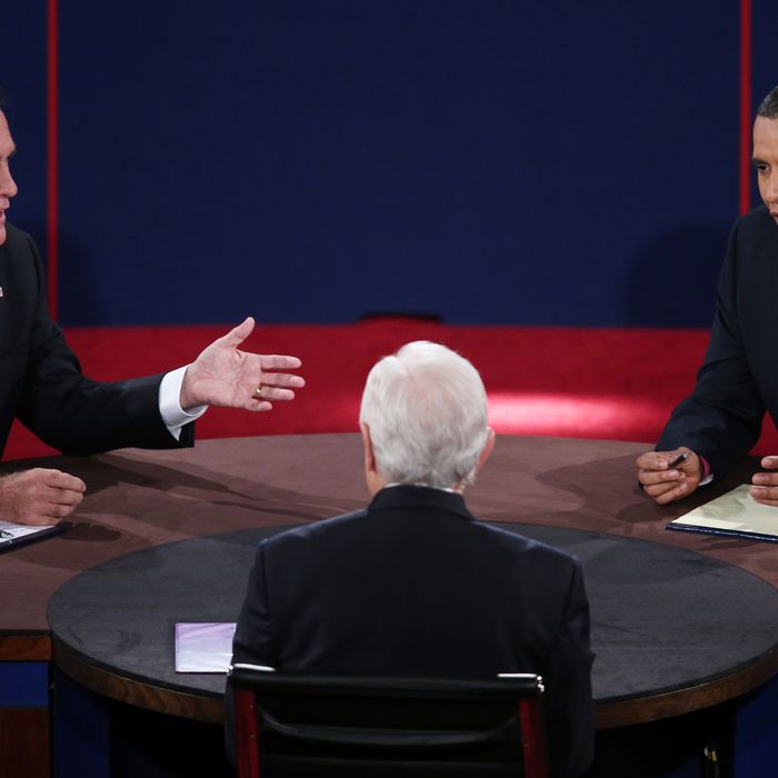 U.S. President Barack Obama (R) debates with Republican presidential candidate Mitt Romney at the Keith C. and Elaine Johnson Wold Performing Arts Center at Lynn University on October 22, 2012 in Boca Raton, Florida. The focus for the final presidential debate before Election Day on November 6 is foreign policy.