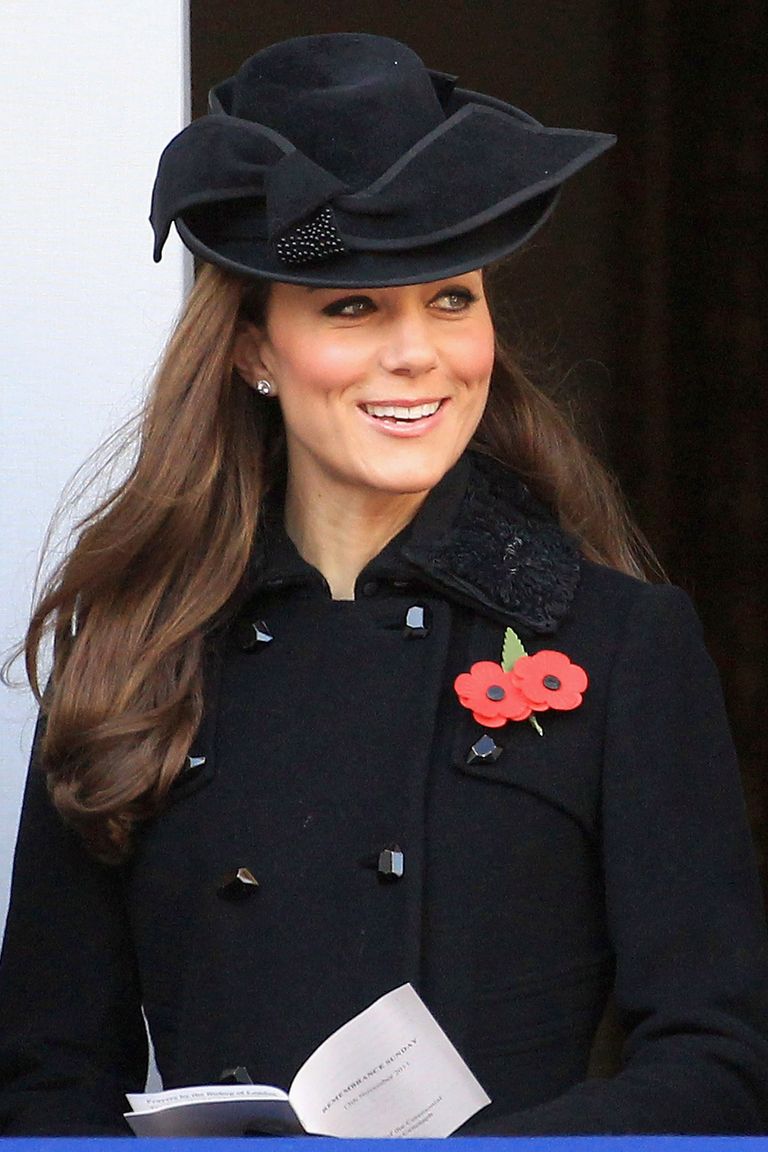 LONDON, UNITED KINGDOM - NOVEMBER 13:  Catherine, Duchess of Cambridge sings during the Remembrance Day Ceremony at the Cenotaph on November 13, 2011 in London, United Kingdom. Politicians and Royalty joined the rest of the county in honouring the war dead by gathering at the iconic memorial to lay wreaths and observe two minutes silence.  (Photo by Chris Jackson/Getty Images)