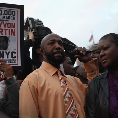 NEW YORK, NY - MARCH 21: Tracy Martin (L), and Sybrina Fulton, parents of slain teenager Trayvon Martin, address supporters at a Million Hoodies March on March 21, 2012 in New York City. Family members joined hundreds of protesters calling for justice in the killing of Trayvon Martin, 17, who was was pursued and shot on February 26 in Sanford, Florida by 