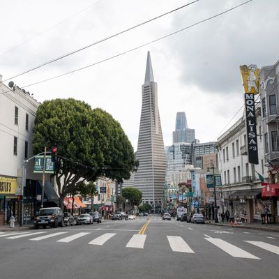 The Transamerica Building stands at the end of an empty Columbus Avenue in San Francisco, California, U.S., on Tuesday, March 17, 2020.